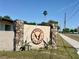 Eagles Landing community entrance sign featuring stone pillars and desert landscaping at 25 Aviation Dr, Winter Haven, FL 33881