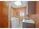 Laundry room with washer, dryer and utility sink at 25 Aviation Dr, Winter Haven, FL 33881
