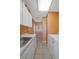 Laundry room with washer, dryer, and cabinets at 25 Aviation Dr, Winter Haven, FL 33881
