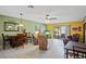 Spacious living room with tile flooring and patio access at 25 Aviation Dr, Winter Haven, FL 33881