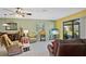 Comfortable living room with access to backyard at 25 Aviation Dr, Winter Haven, FL 33881