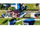 Aerial view showcasing the home, pool, and surrounding landscape at 3001 Crystal Beach Rd, Winter Haven, FL 33880