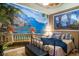 Bedroom with a scenic mural and comfortable bedding at 3001 Crystal Beach Rd, Winter Haven, FL 33880