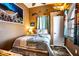 Nautical themed bedroom with ocean art and tiled floors at 3001 Crystal Beach Rd, Winter Haven, FL 33880