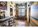 Charming breakfast nook with a unique bicycle decor and water views at 3001 Crystal Beach Rd, Winter Haven, FL 33880