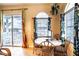 Small dining area with table and chairs, water view at 3001 Crystal Beach Rd, Winter Haven, FL 33880