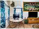 Bright dining area with table and chairs, tropical decor and large window at 3001 Crystal Beach Rd, Winter Haven, FL 33880
