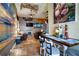 Casual dining area with a rustic wooden table and lake views at 3001 Crystal Beach Rd, Winter Haven, FL 33880