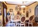 Bright dining room featuring an oval table and ornate chairs at 3001 Crystal Beach Rd, Winter Haven, FL 33880
