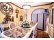 Elegant formal dining room with ornate furniture and decorative accents at 3001 Crystal Beach Rd, Winter Haven, FL 33880