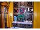 Elegant entryway with ornate wall decor and grand clock at 3001 Crystal Beach Rd, Winter Haven, FL 33880