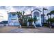 Grand two-story house with palm trees and circular driveway at 3001 Crystal Beach Rd, Winter Haven, FL 33880