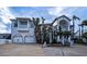 Two-story home with double garage and lush landscaping at 3001 Crystal Beach Rd, Winter Haven, FL 33880