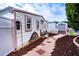 White house with a walkway and colorful Lego-like design at 3001 Crystal Beach Rd, Winter Haven, FL 33880