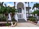 Two story home with grand entrance and landscaping at 3001 Crystal Beach Rd, Winter Haven, FL 33880