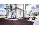 White house with unique landscaping and statue at 3001 Crystal Beach Rd, Winter Haven, FL 33880