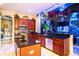 Large kitchen with an island and built-in aquarium at 3001 Crystal Beach Rd, Winter Haven, FL 33880