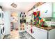 Colorful kitchen with Lego decor and adjacent bathroom at 3001 Crystal Beach Rd, Winter Haven, FL 33880
