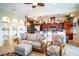 Cozy living room with light gray couch and adjoining kitchen at 3001 Crystal Beach Rd, Winter Haven, FL 33880