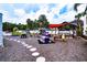 Play area with slides, swings, and playset at 3001 Crystal Beach Rd, Winter Haven, FL 33880