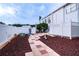 Landscaped yard with a brick-like pathway at 3001 Crystal Beach Rd, Winter Haven, FL 33880
