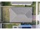 Aerial view of a house roof and backyard at 3285 Weitzel Dr, Haines City, FL 33844