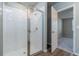 Bathroom with a tiled shower and glass enclosure at 3285 Weitzel Dr, Haines City, FL 33844