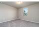 Cozy bedroom with neutral walls and carpet flooring at 3285 Weitzel Dr, Haines City, FL 33844