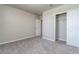 Well-lit bedroom with ample closet space and carpet flooring at 3285 Weitzel Dr, Haines City, FL 33844