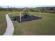 Aerial view of a playground with slides and a shaded area at 3285 Weitzel Dr, Haines City, FL 33844