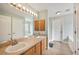 Elegant bathroom with dual sinks and a large mirror at 359 Mandolin Ln, Winter Haven, FL 33884