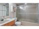 Bathroom with shower/tub combo and wood vanity at 38 Grenewood Ln, Haines City, FL 33844