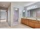 Double vanity bathroom with access to a shower at 38 Grenewood Ln, Haines City, FL 33844