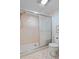 Bathroom with walk-in shower and built-in seat at 38 Grenewood Ln, Haines City, FL 33844