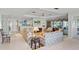 Spacious living room with tile floors and access to a patio at 38 Grenewood Ln, Haines City, FL 33844