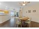 Bright dining room adjacent to kitchen, featuring a table with chairs at 4068 Carteret Dr, Winter Haven, FL 33884