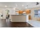 Modern kitchen with wood cabinets, ample counter space, and stainless steel appliances at 4068 Carteret Dr, Winter Haven, FL 33884