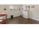 Home office with dark wood floors and built in shelving at 4068 Carteret Dr, Winter Haven, FL 33884
