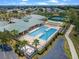 Aerial view of community pool, tennis, and recreation areas at 4068 Carteret Dr, Winter Haven, FL 33884