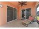 Relaxing screened porch with tiled floors and lounge chair at 4068 Carteret Dr, Winter Haven, FL 33884