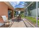 Spacious screened-in porch with seating area at 4068 Carteret Dr, Winter Haven, FL 33884