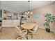 Kitchen and dining area with a table and four chairs at 4413 Strathmore Dr, Lake Wales, FL 33859