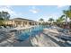 Community pool with plenty of lounge chairs at 4462 Micanope Crescent Dr, Lakeland, FL 33811