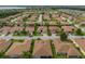 Aerial view showing a single-Gathering house in a residential neighborhood at 4489 Strathmore Dr, Lake Wales, FL 33859