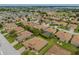 Aerial view of house in a residential community at 4489 Strathmore Dr, Lake Wales, FL 33859