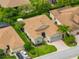 Top-down view of single-Gathering home with a brown roof at 4489 Strathmore Dr, Lake Wales, FL 33859