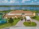 Aerial view of community clubhouse, tennis courts, and pickleball courts at 4489 Strathmore Dr, Lake Wales, FL 33859