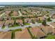 Aerial view of a house in a residential neighborhood at 4489 Strathmore Dr, Lake Wales, FL 33859