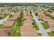 Aerial view of home with neighborhood in background at 4489 Strathmore Dr, Lake Wales, FL 33859