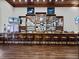 Long bar with plenty of seating and a relaxed atmosphere at 4489 Strathmore Dr, Lake Wales, FL 33859